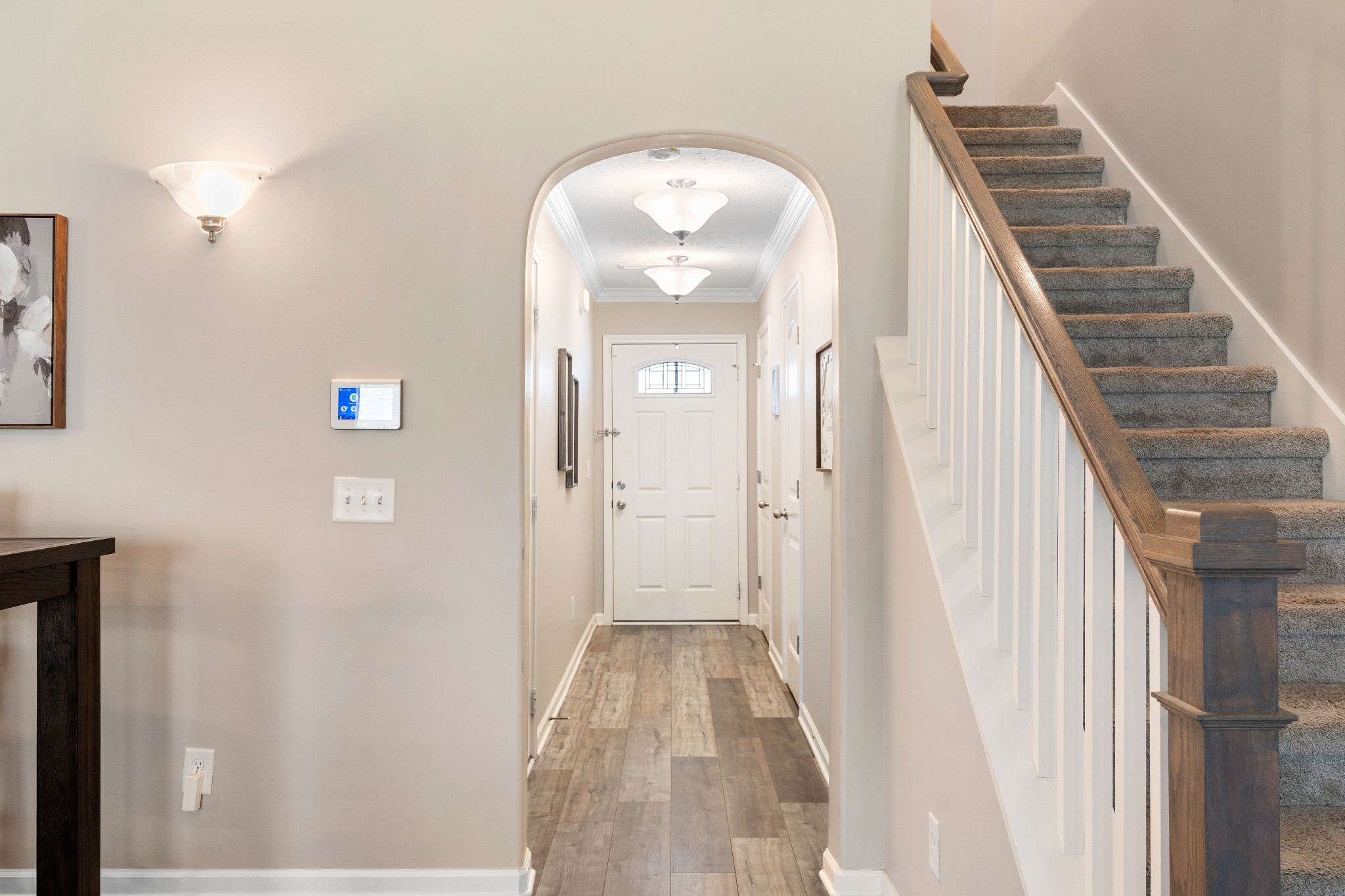 1626 Calcutta Drive Murfreesboro, TN 37128 - Photo 9 of 35 a view of a hallway with wooden floor and entryway