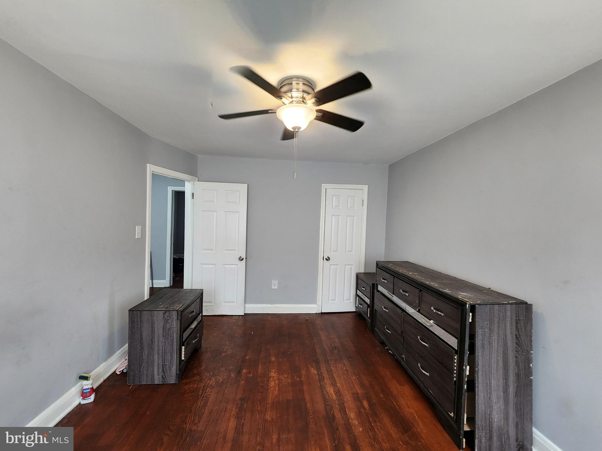 1310 Edison Highway Baltimore, MD 21213 - Photo 24 of 31 a view of workspace with wooden floor and ceiling fan