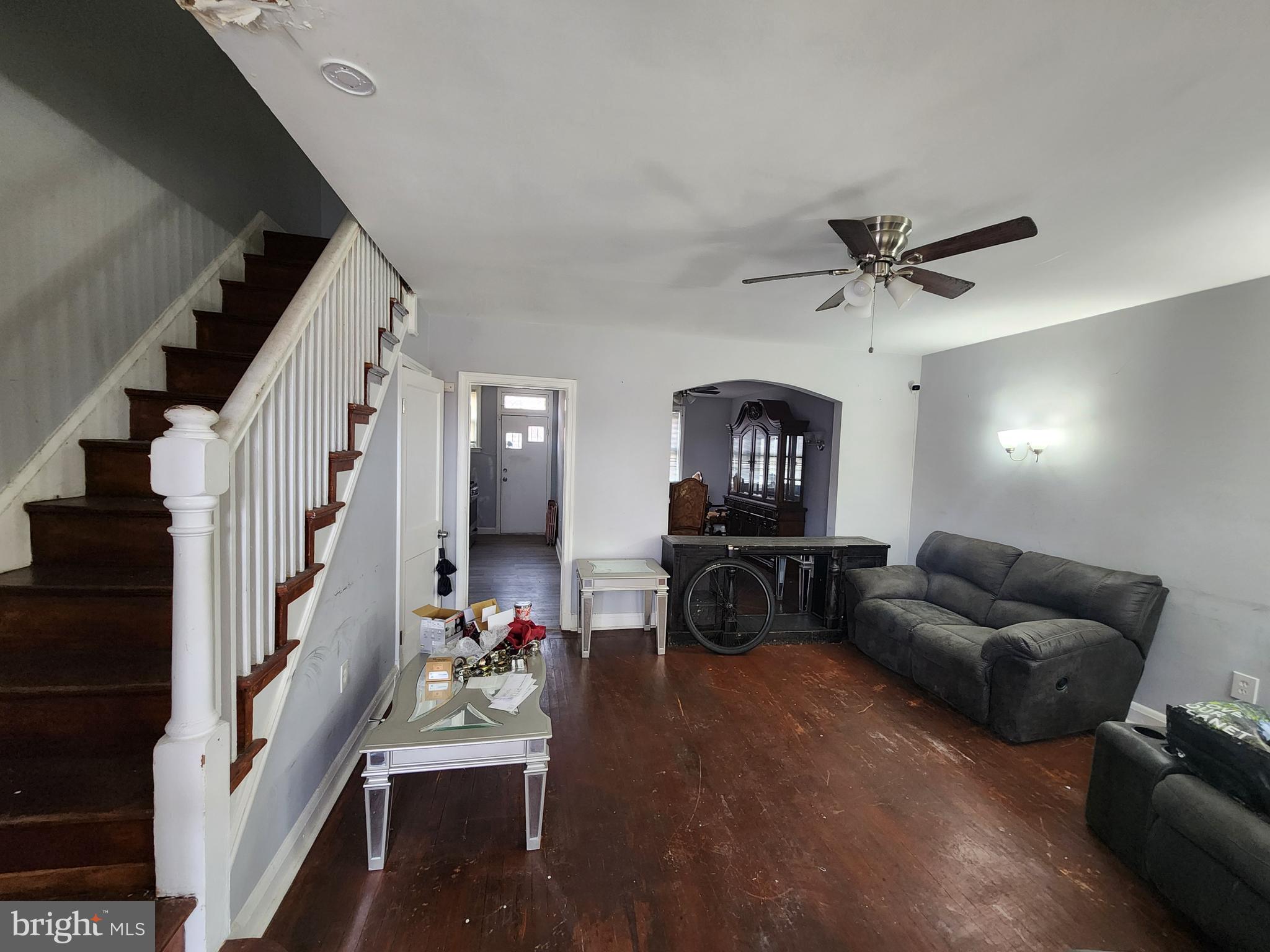 1310 Edison Highway Baltimore, MD 21213 - Photo 4 of 31 a living room with furniture and a flat screen tv
