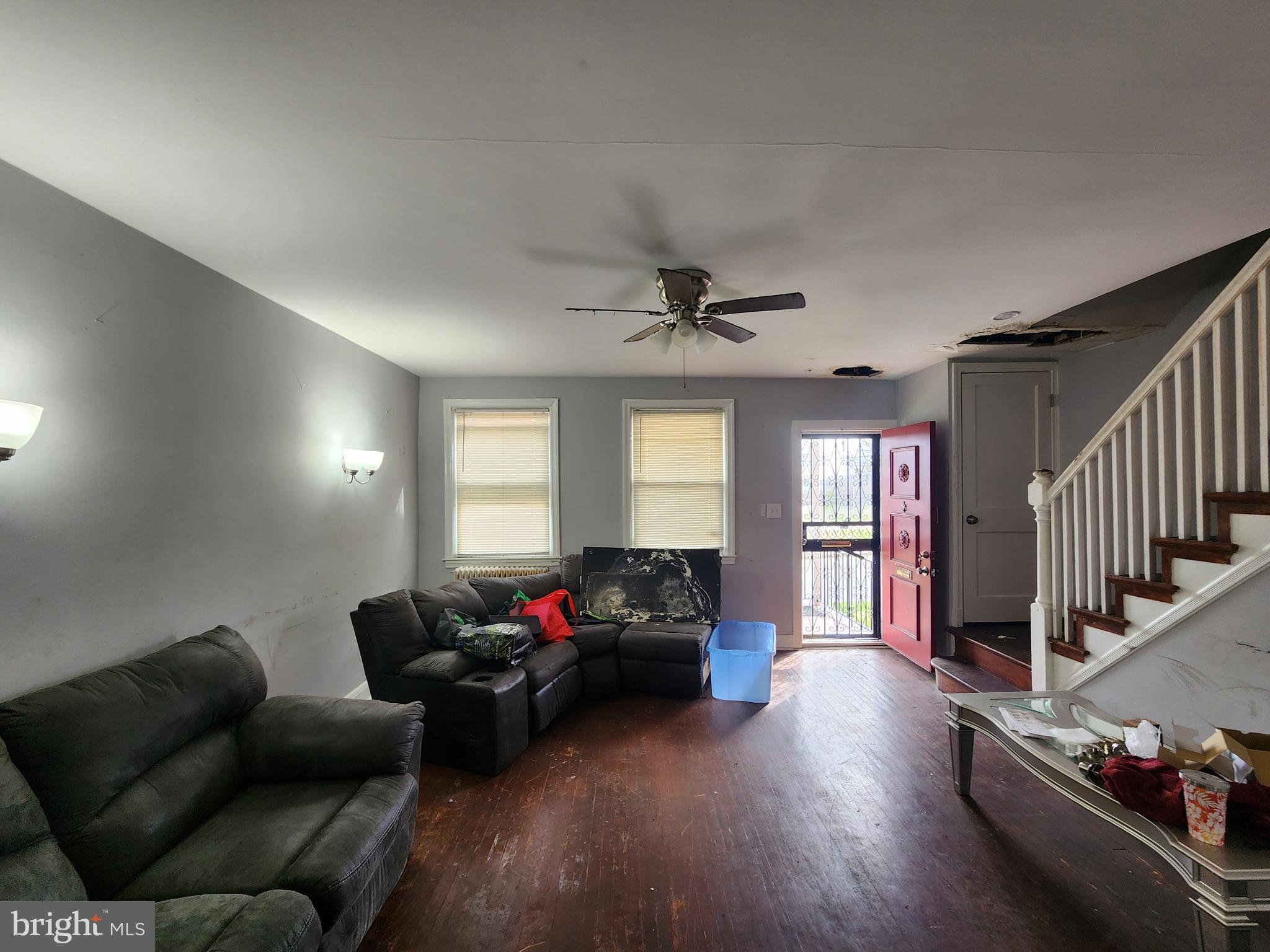 1310 Edison Highway Baltimore, MD 21213 - Photo 7 of 31 a living room with furniture window and wooden floor