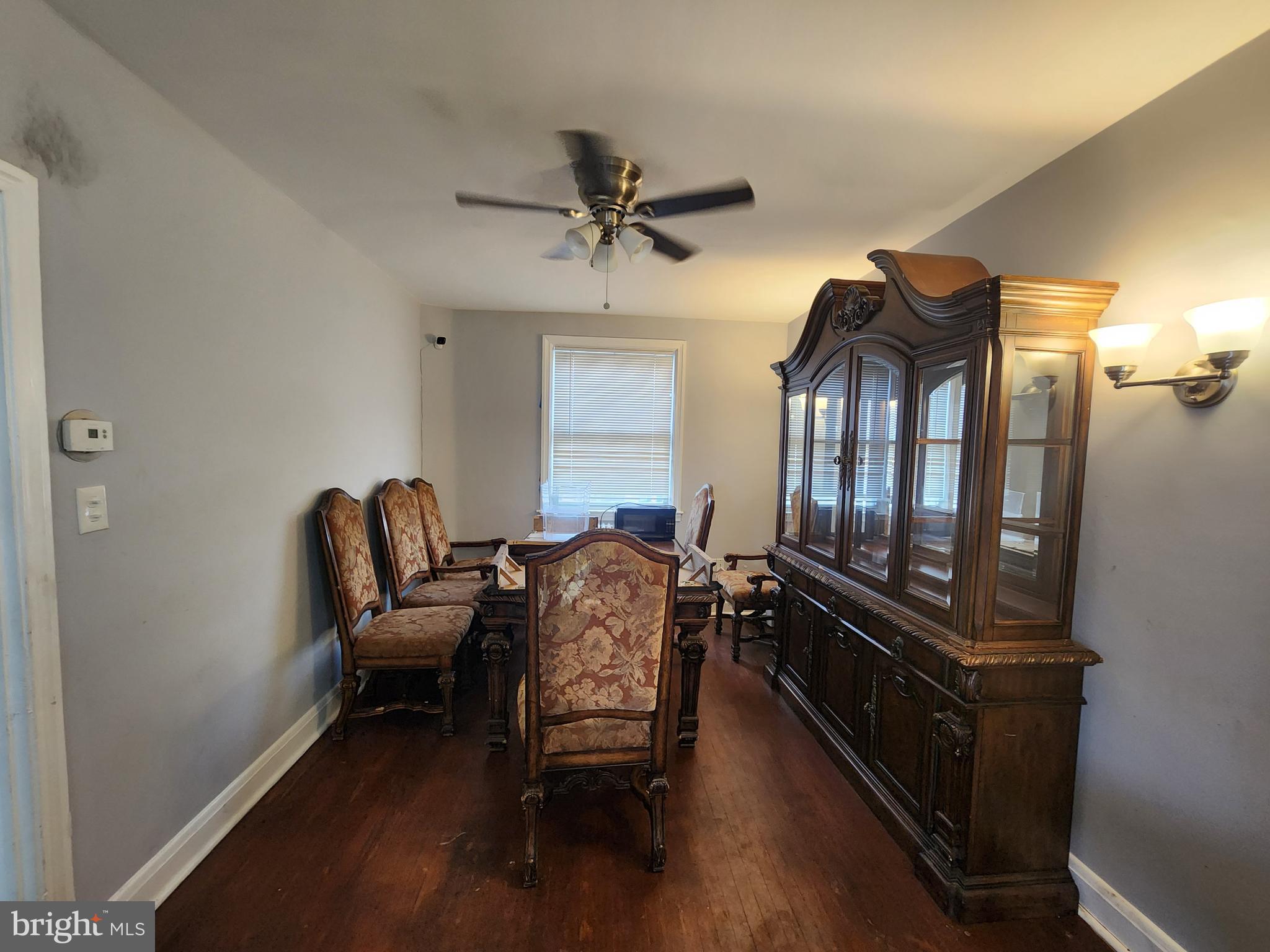 1310 Edison Highway Baltimore, MD 21213 - Photo 8 of 31 a living room with furniture and a chandelier