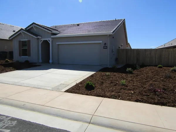 a front view of house with pathway