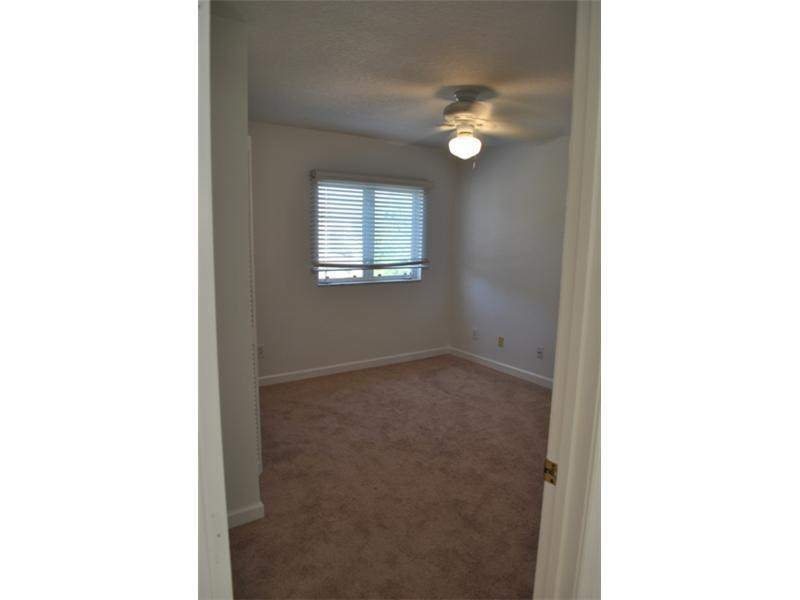 720 Natures Cove Road Dania Beach, FL 33004 - Photo 12 of 17 a view of a hallway with windows