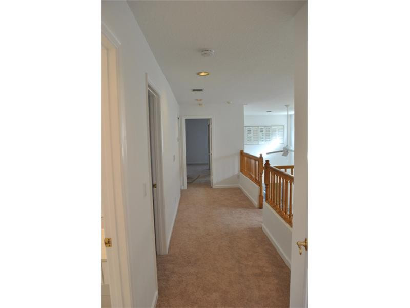 720 Natures Cove Road Dania Beach, FL 33004 - Photo 15 of 17 a view of a hallway with a white walls