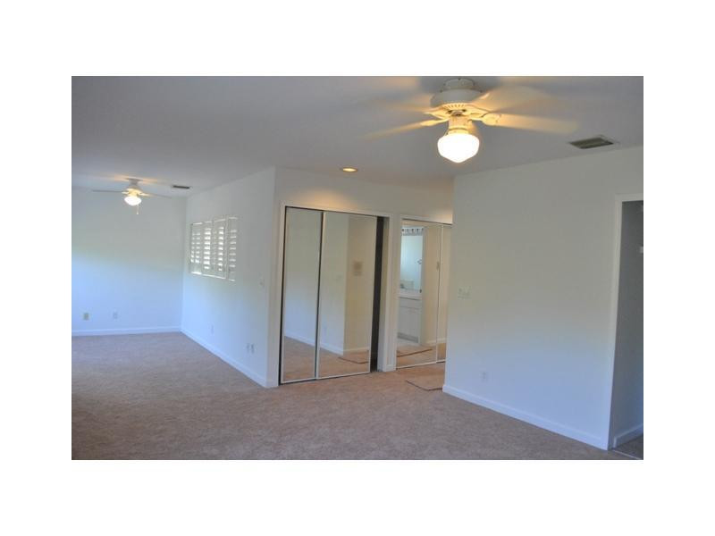 720 Natures Cove Road Dania Beach, FL 33004 - Photo 8 of 17 a open hall with closet