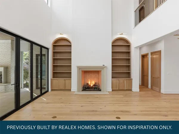 a view of living room with furniture and a window