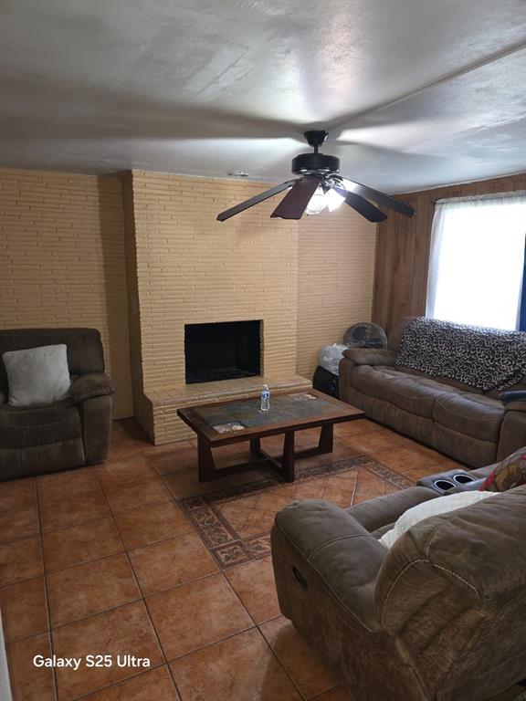446 Northwest 119th Street Miami, FL 33168 - Photo 3 of 14 a living room with furniture a ceiling fan and a rug