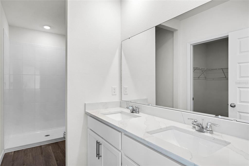 1726 Hummingbird Road Winter Haven, FL 33884 - Photo 16 of 28 a bathroom with a sink and a mirror