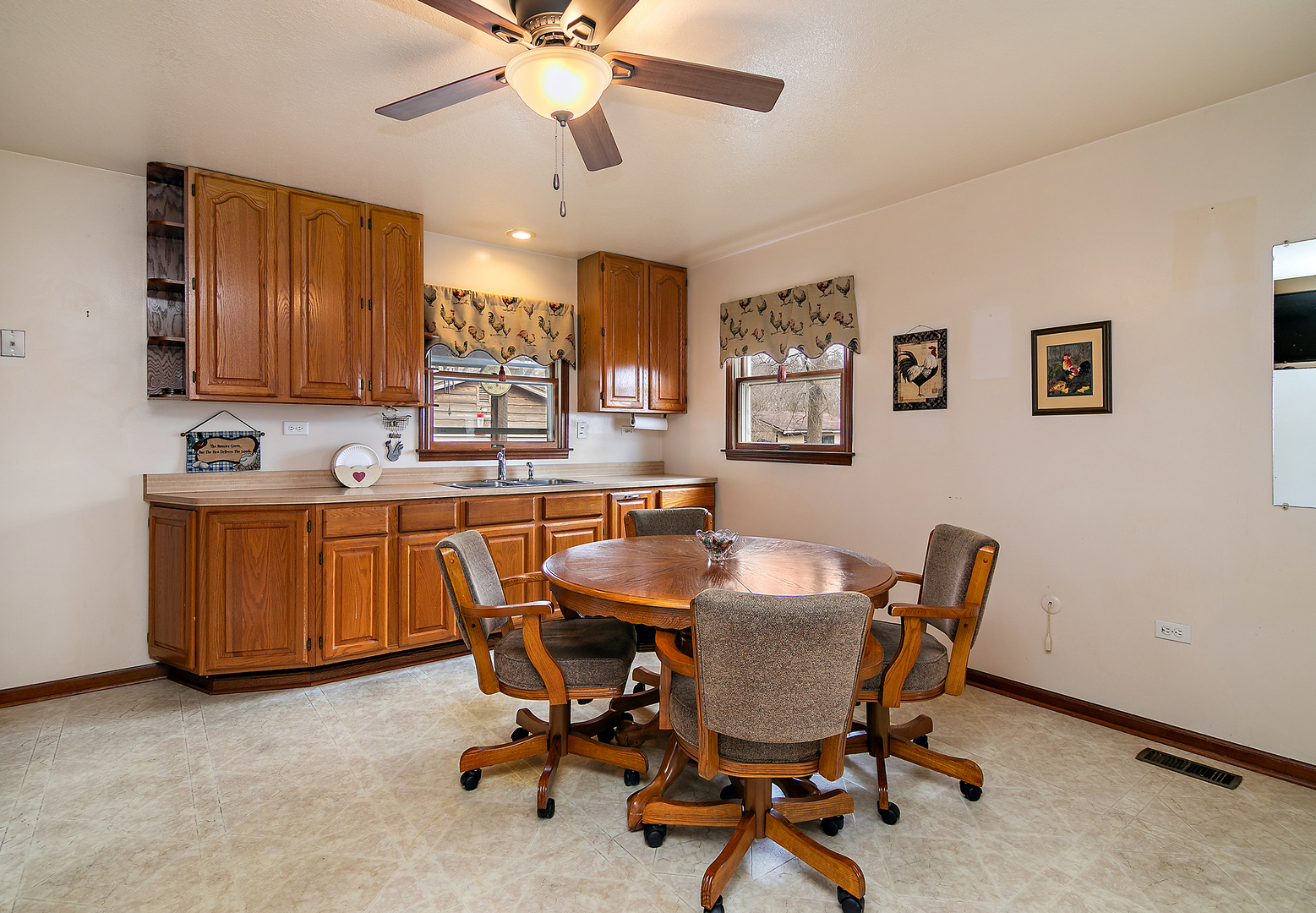 209 East Vanderkarr Road St. Anne, IL 60964 - Photo 8 of 23 a view of a dining room with furniture