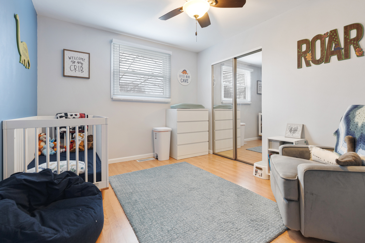 206 Yuma Lane Carol Stream, IL 60188 - Photo 13 of 26 a bedroom with furniture and a book shelf