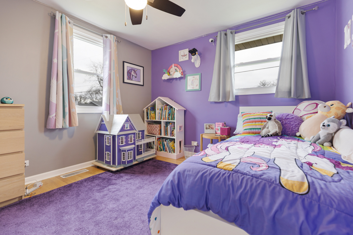206 Yuma Lane Carol Stream, IL 60188 - Photo 14 of 26 a bedroom with a bed and a dresser