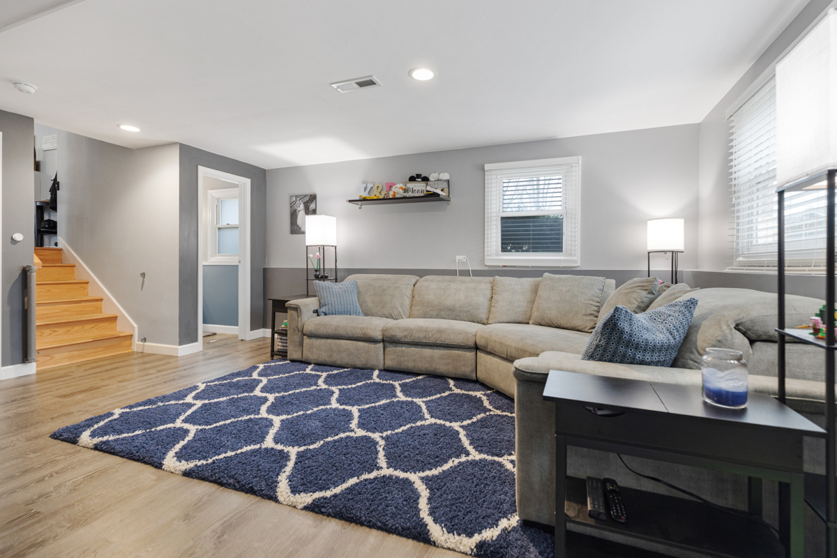206 Yuma Lane Carol Stream, IL 60188 - Photo 15 of 26 a living room with furniture and a rug