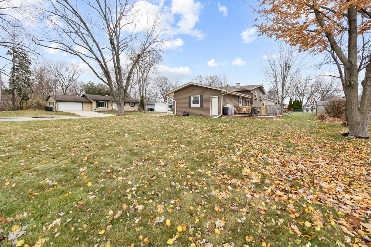 206 Yuma Lane Carol Stream, IL 60188 - Photo 24 of 26 a view of a house with a yard covered with snow