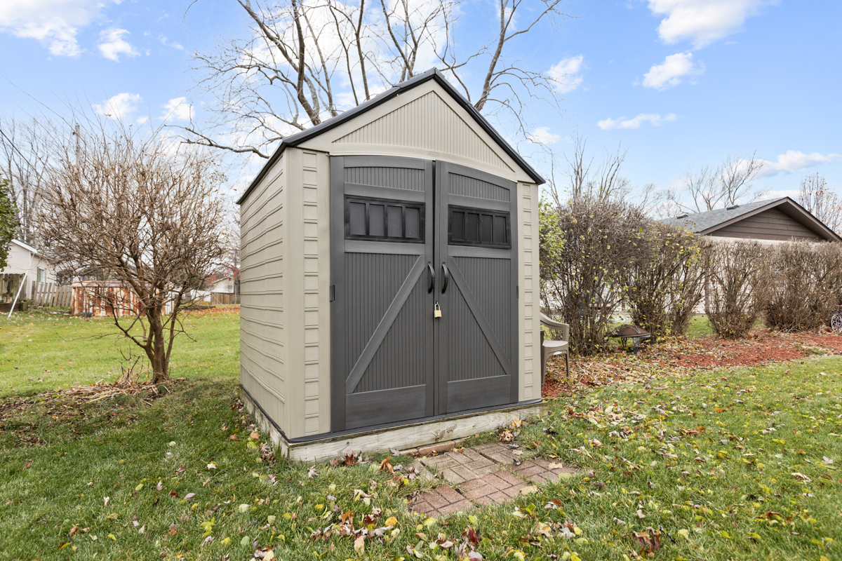 206 Yuma Lane Carol Stream, IL 60188 - Photo 26 of 26 a front view of a house with a yard