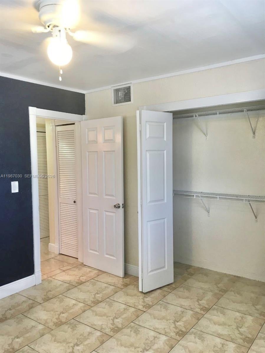 4250 Southwest 67th Avenue, Unit 32 Miami, FL 33155 - Photo 5 of 10 a view of an empty room