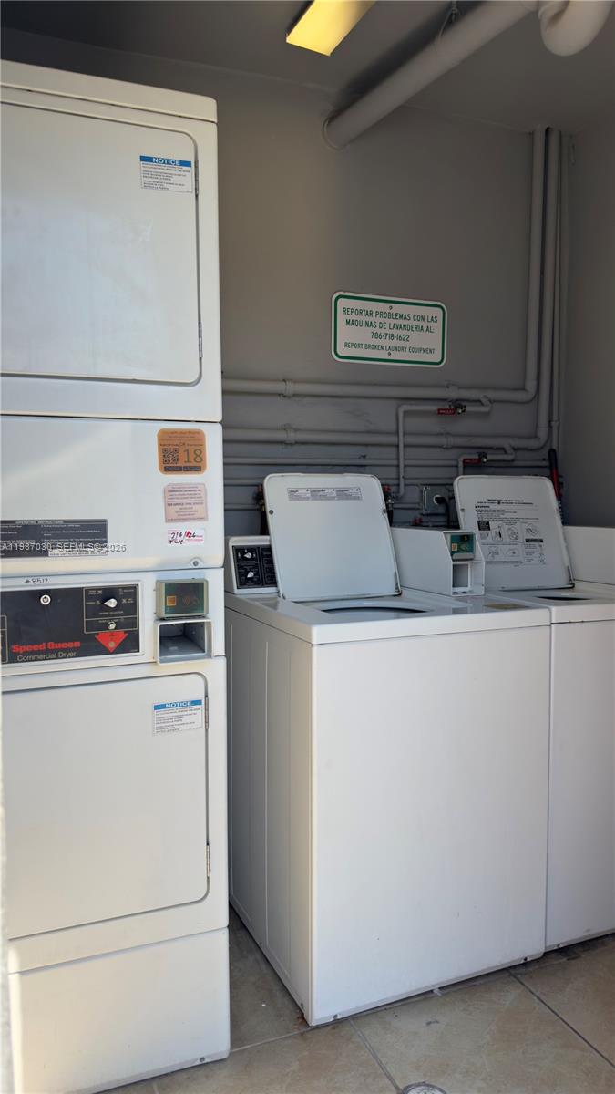 4250 Southwest 67th Avenue, Unit 32 Miami, FL 33155 - Photo 7 of 10 a utility room with dryer and washer
