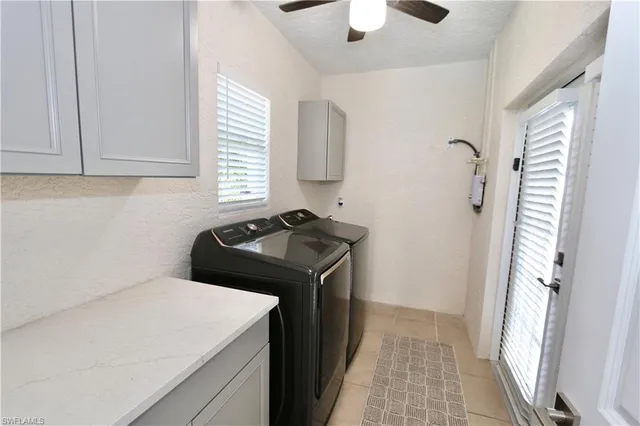 a bathroom with a sink and a large mirror