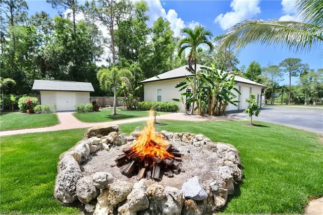 a view of a playground with basketball court