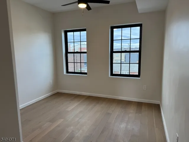 a view of a livingroom from a hallway