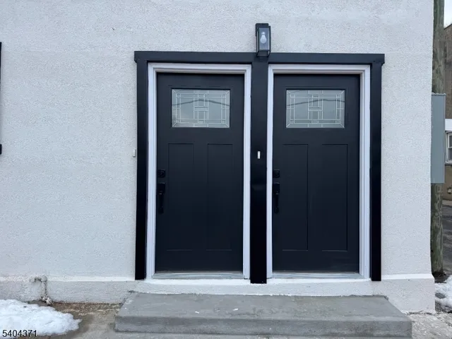 a view of a cafe with sitting area