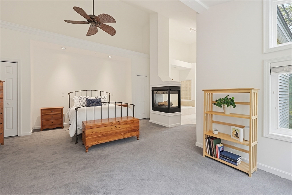 3002 Maple Brook Road, Unit 3002 Bellingham, MA 02019 - Photo 21 of 42 a bedroom with furniture and a window