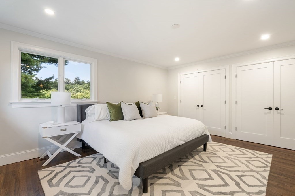 34 Donna Road Newton, MA 02459 - Photo 11 of 31 a spacious bedroom with a bed and a window