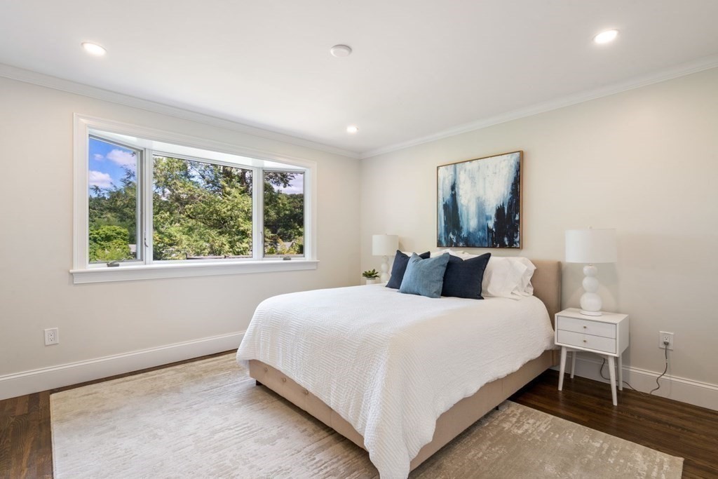 34 Donna Road Newton, MA 02459 - Photo 15 of 31 a bedroom with a bed and a large window