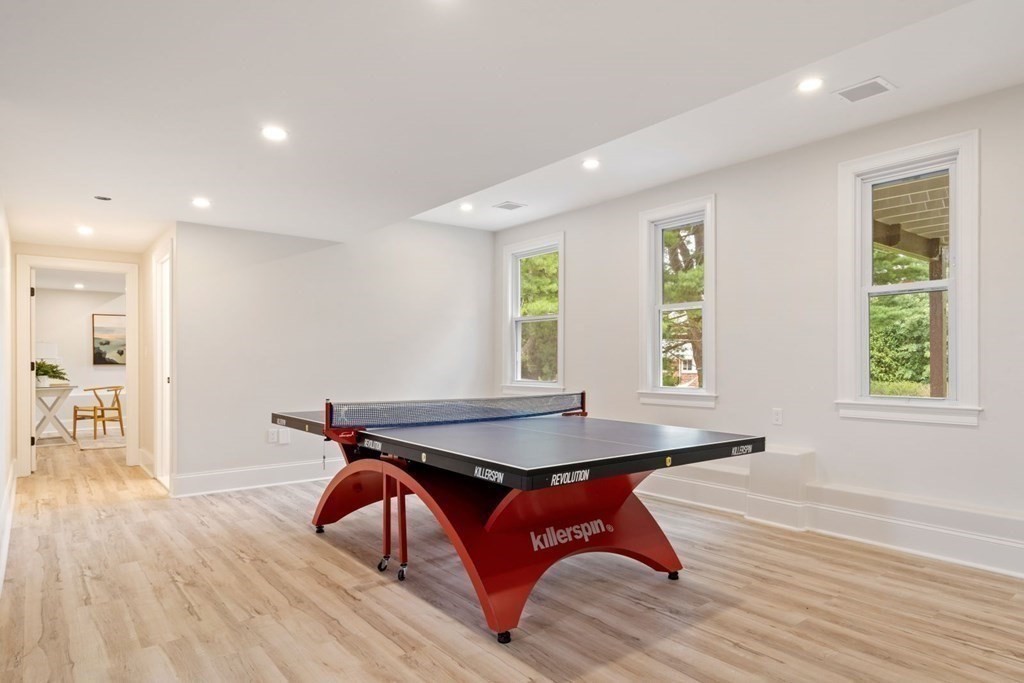 34 Donna Road Newton, MA 02459 - Photo 19 of 31 a dining room with a table and chairs