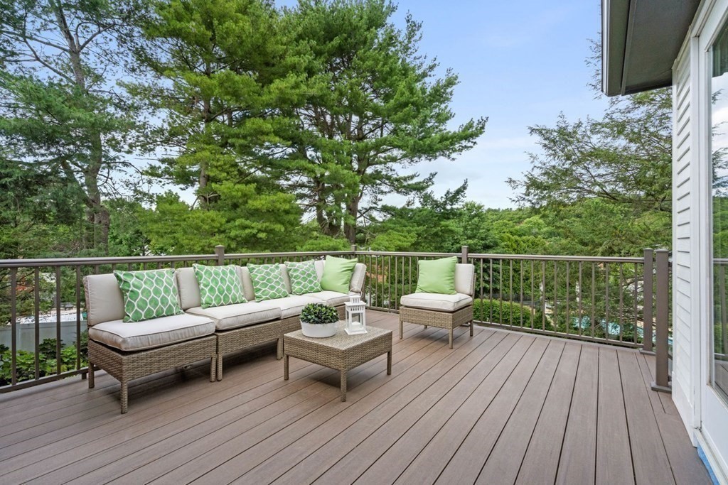 34 Donna Road Newton, MA 02459 - Photo 23 of 31 a balcony with wooden floor table and chairs