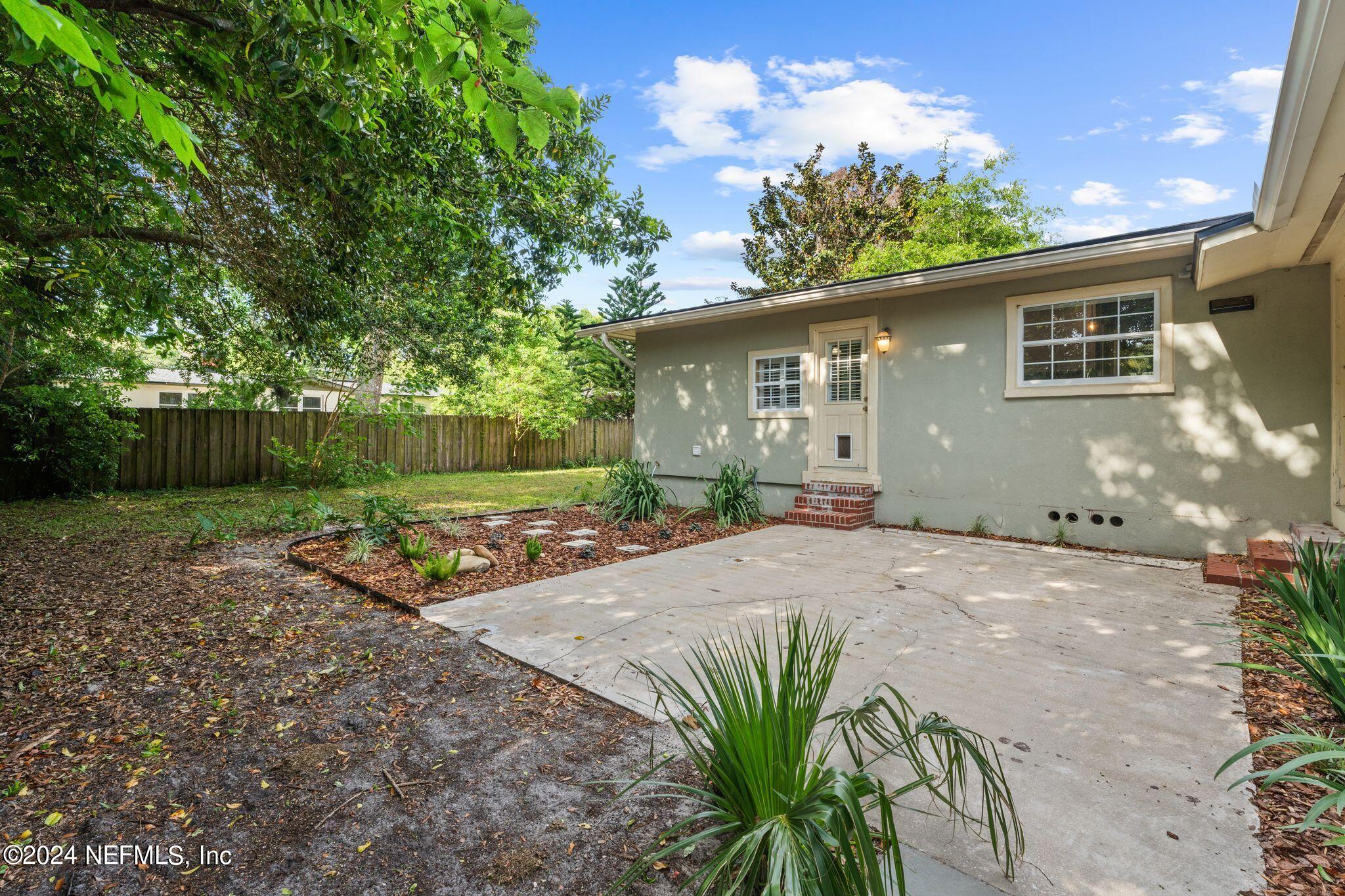 1704 Furman Road Jacksonville, FL 32217 - Photo 24 of 26 a front view of a house with garden