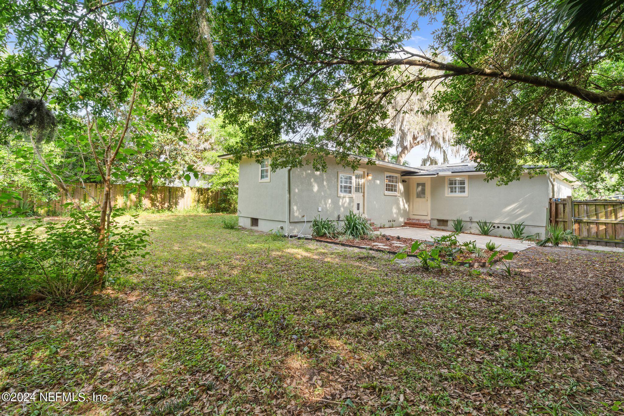 1704 Furman Road Jacksonville, FL 32217 - Photo 25 of 26 a front view of a house with garden