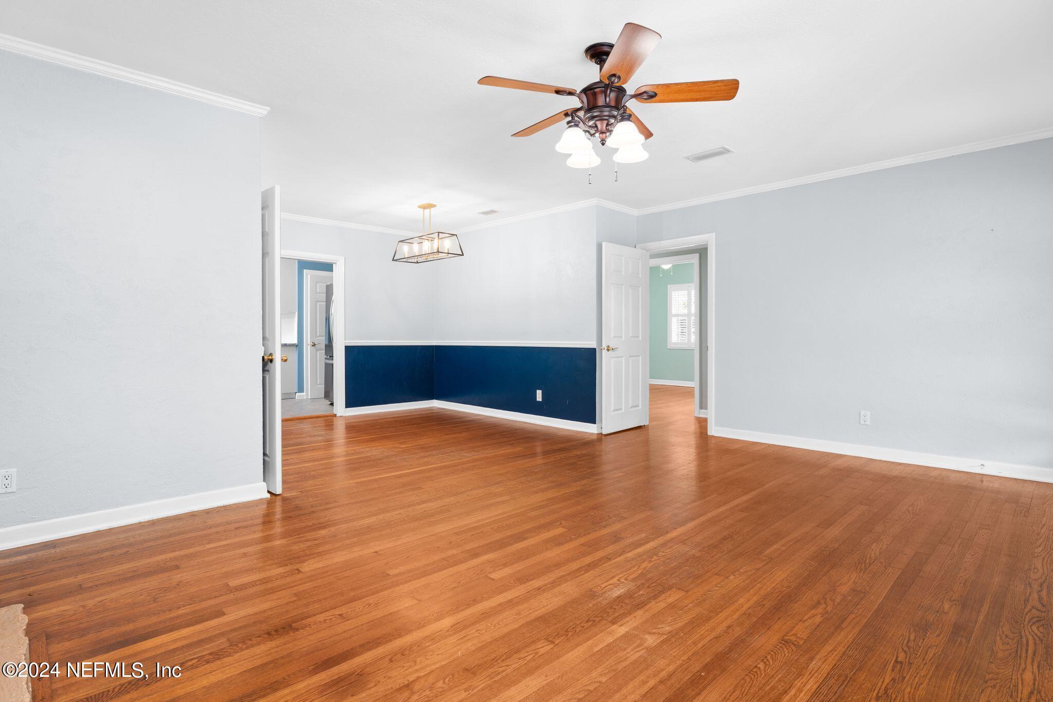 1704 Furman Road Jacksonville, FL 32217 - Photo 4 of 26 a view of empty room with wooden floor