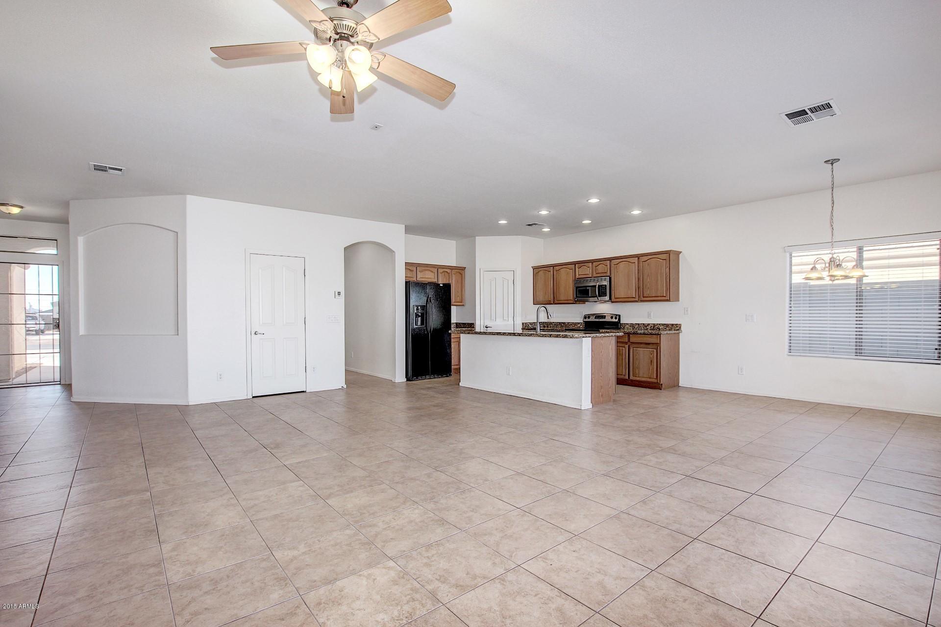 3036 East St John Road Phoenix, AZ 85032 - Photo 12 of 33 a view of a kitchen with a sink and microwave