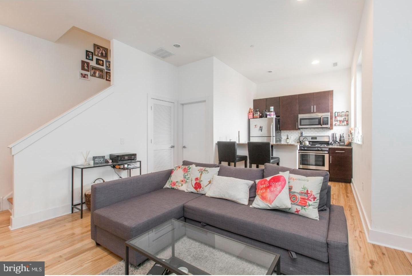1234 North 30th Street Philadelphia, PA 19121 - Photo 13 of 59 a living room with furniture and a couch