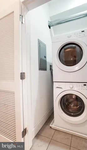 a room with furniture and a flat screen tv