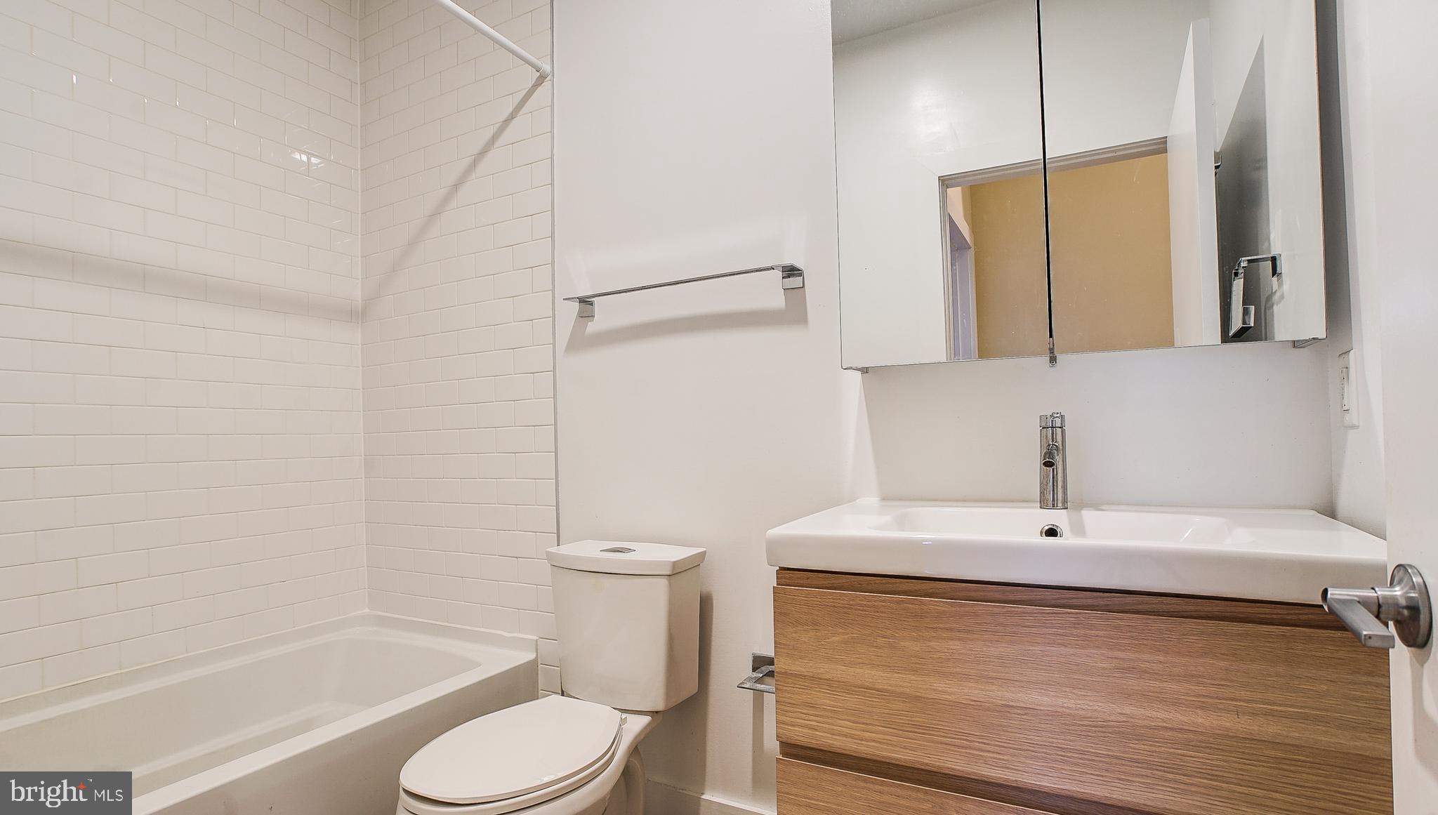 1234 North 30th Street Philadelphia, PA 19121 - Photo 24 of 59 a bathroom with a sink toilet and shower