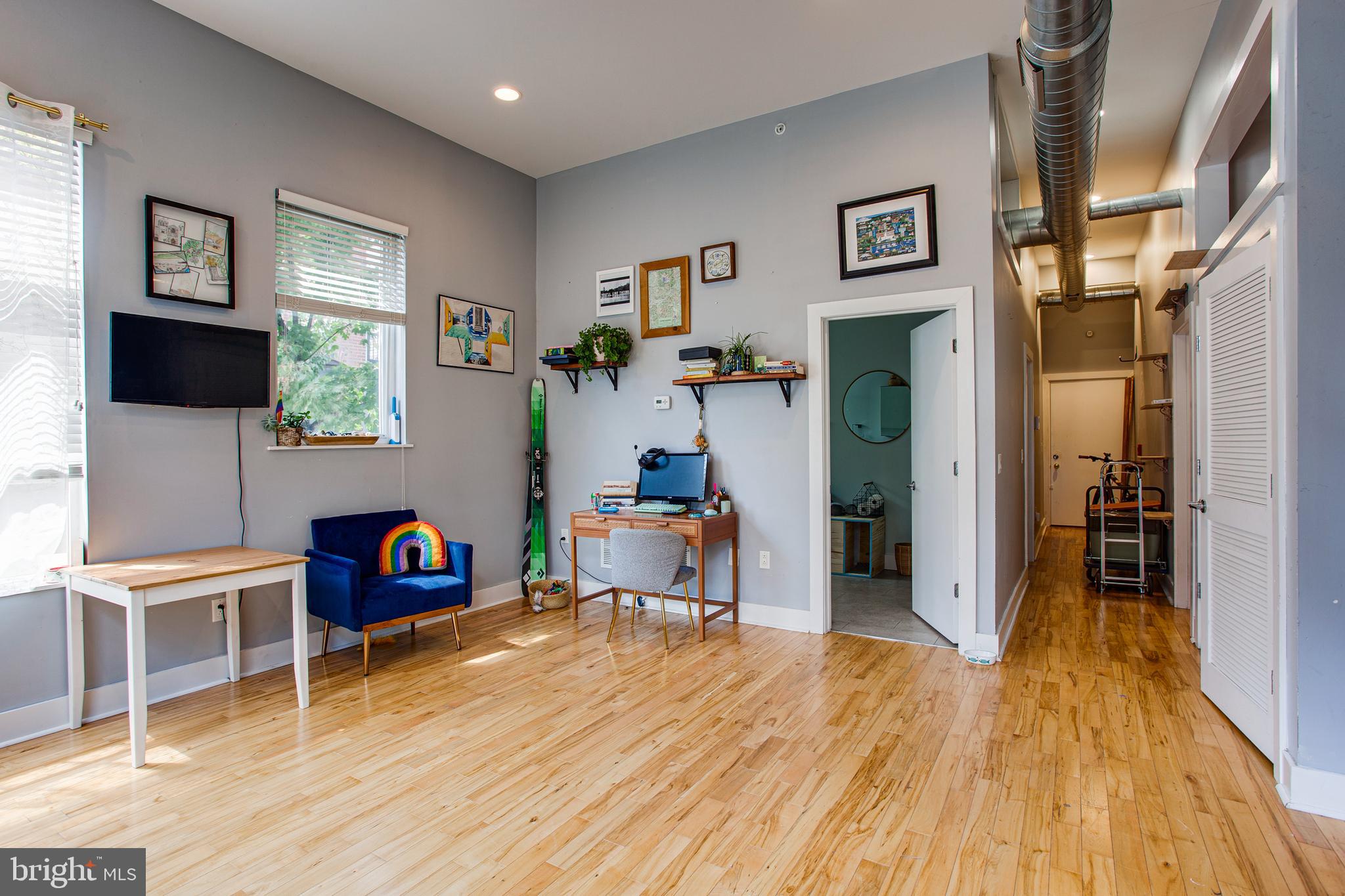 1234 North 30th Street Philadelphia, PA 19121 - Photo 27 of 59 a room with furniture and a flat screen tv