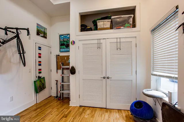 a front view of a building with a lot of windows