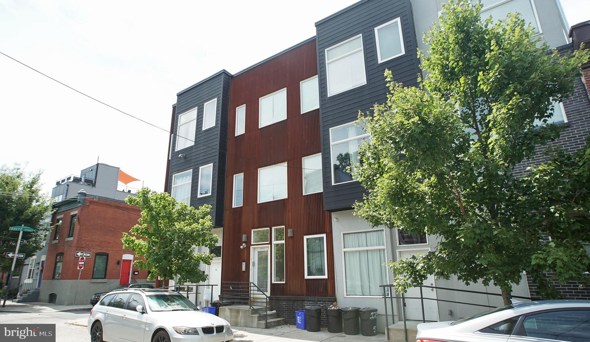 1234 North 30th Street Philadelphia, PA 19121 - Photo 55 of 59 a front view of a building with trees