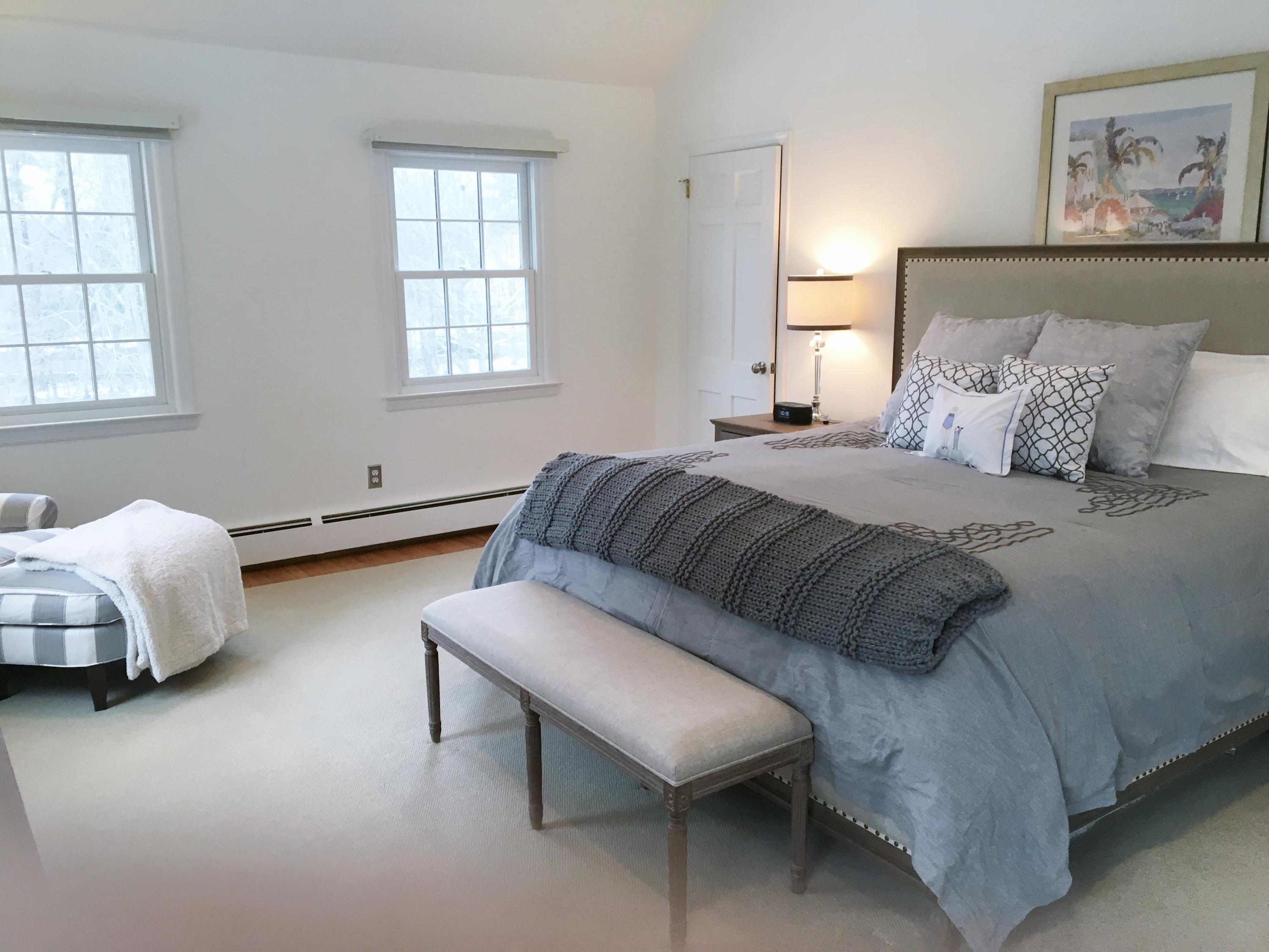 390 Middlesex Road Darien, CT 06820 - Photo 11 of 24 a bedroom with a bed and window