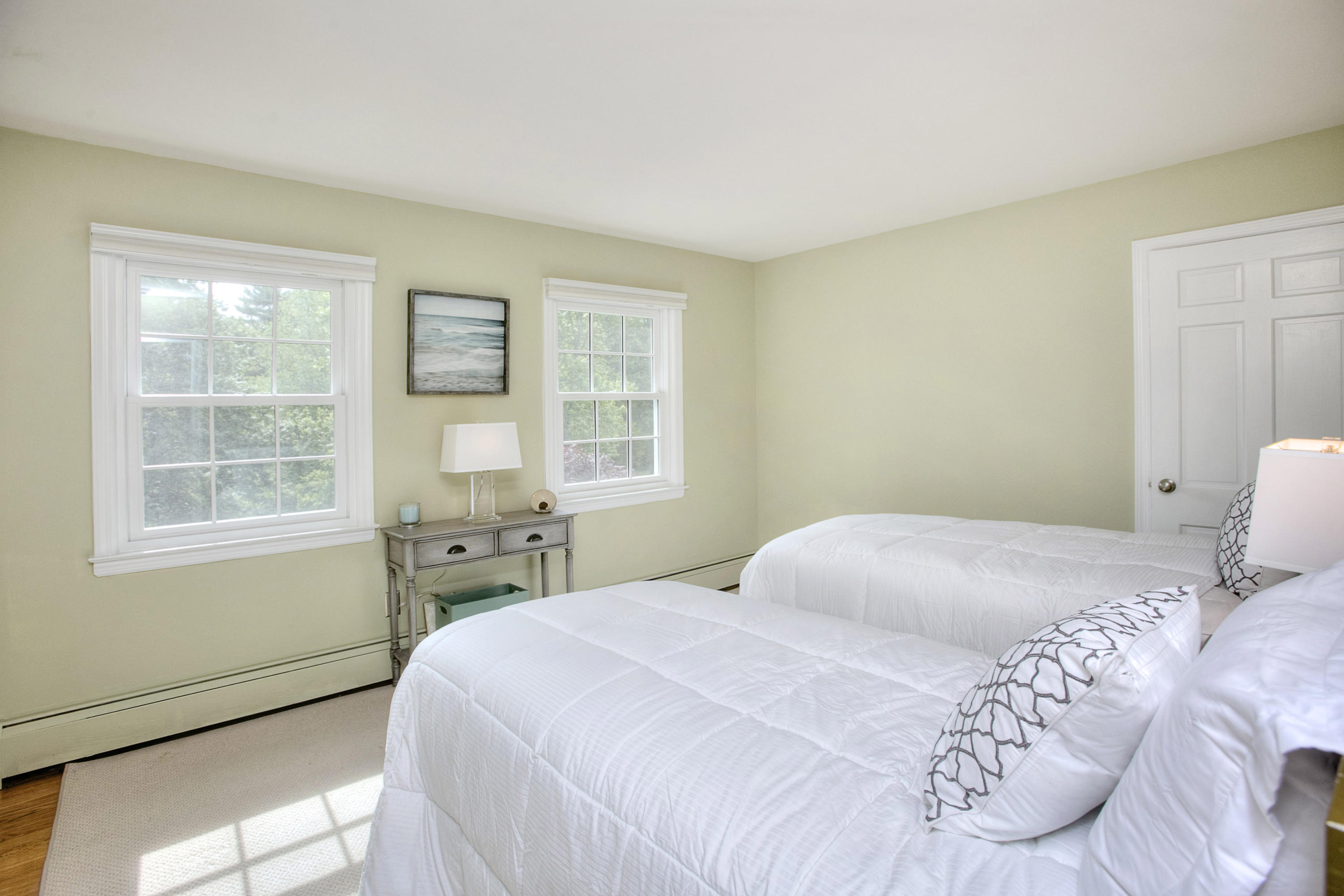 390 Middlesex Road Darien, CT 06820 - Photo 15 of 24 a bedroom with a bed and a window