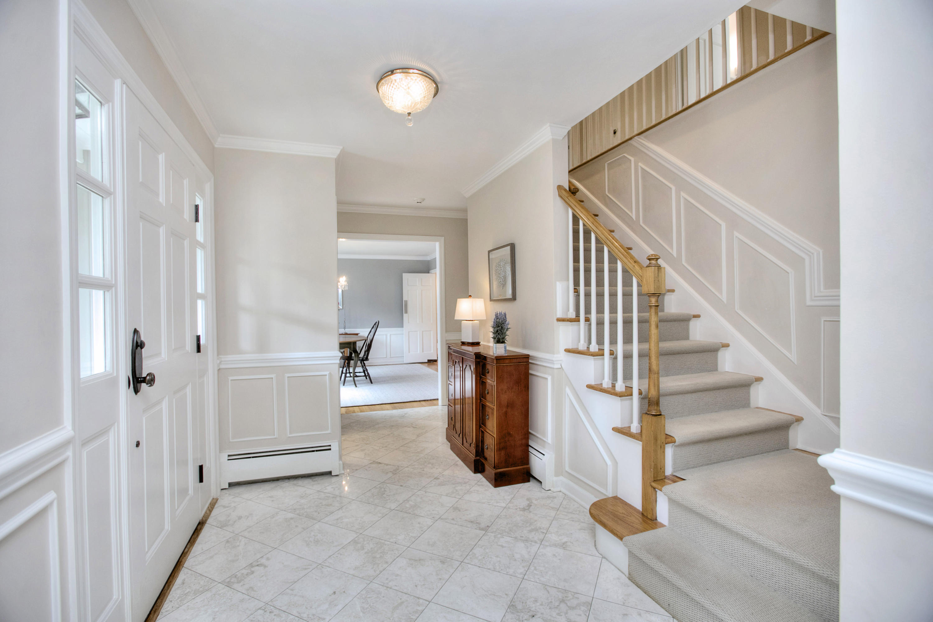 390 Middlesex Road Darien, CT 06820 - Photo 2 of 24 a view of entryway and hall with wooden floor