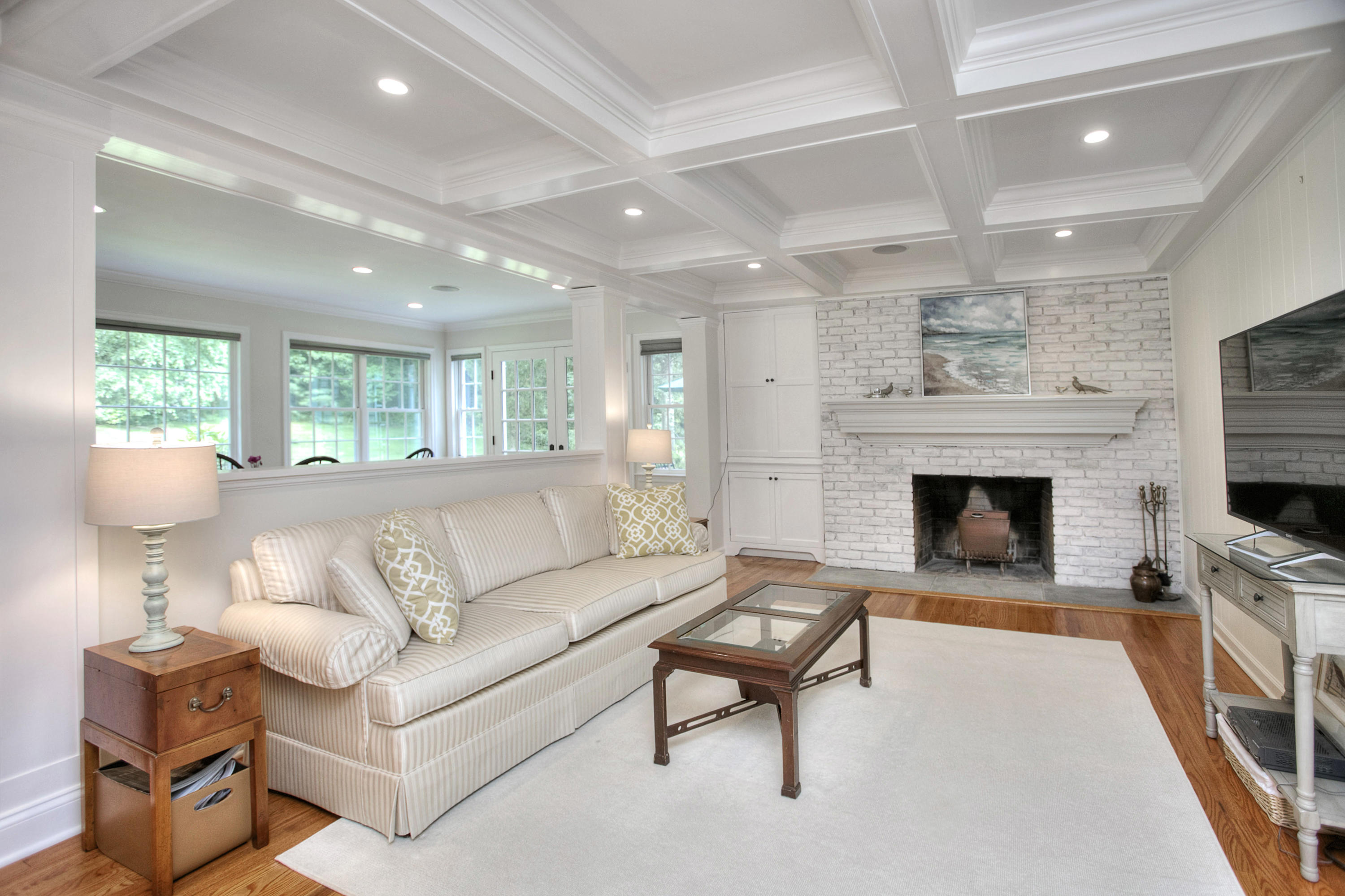 390 Middlesex Road Darien, CT 06820 - Photo 9 of 24 a living room with furniture and a fireplace