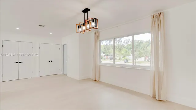 a view of a window in an empty room