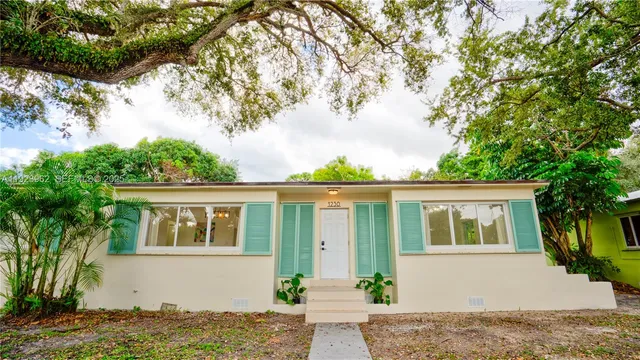 front view of house with a yard