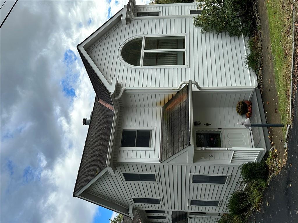 8 Asher Road Rhinebeck, NY 12572 - Photo 1 of 1 a front view of a house with a yard