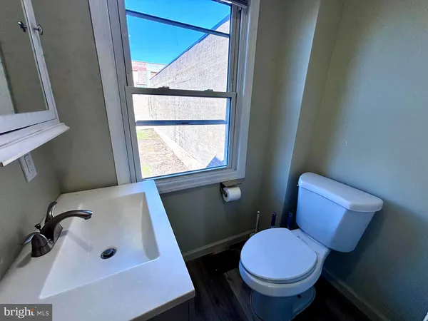 a bathroom with a sink and a toilet