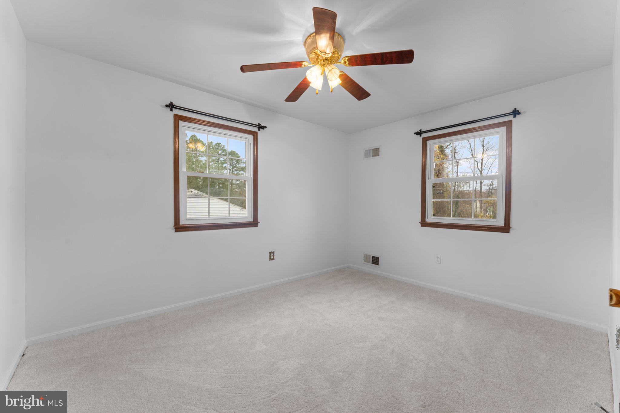 19227 Cardinal Heights Road Triangle, VA 22172 - Photo 26 of 64 a view of an empty room with a window