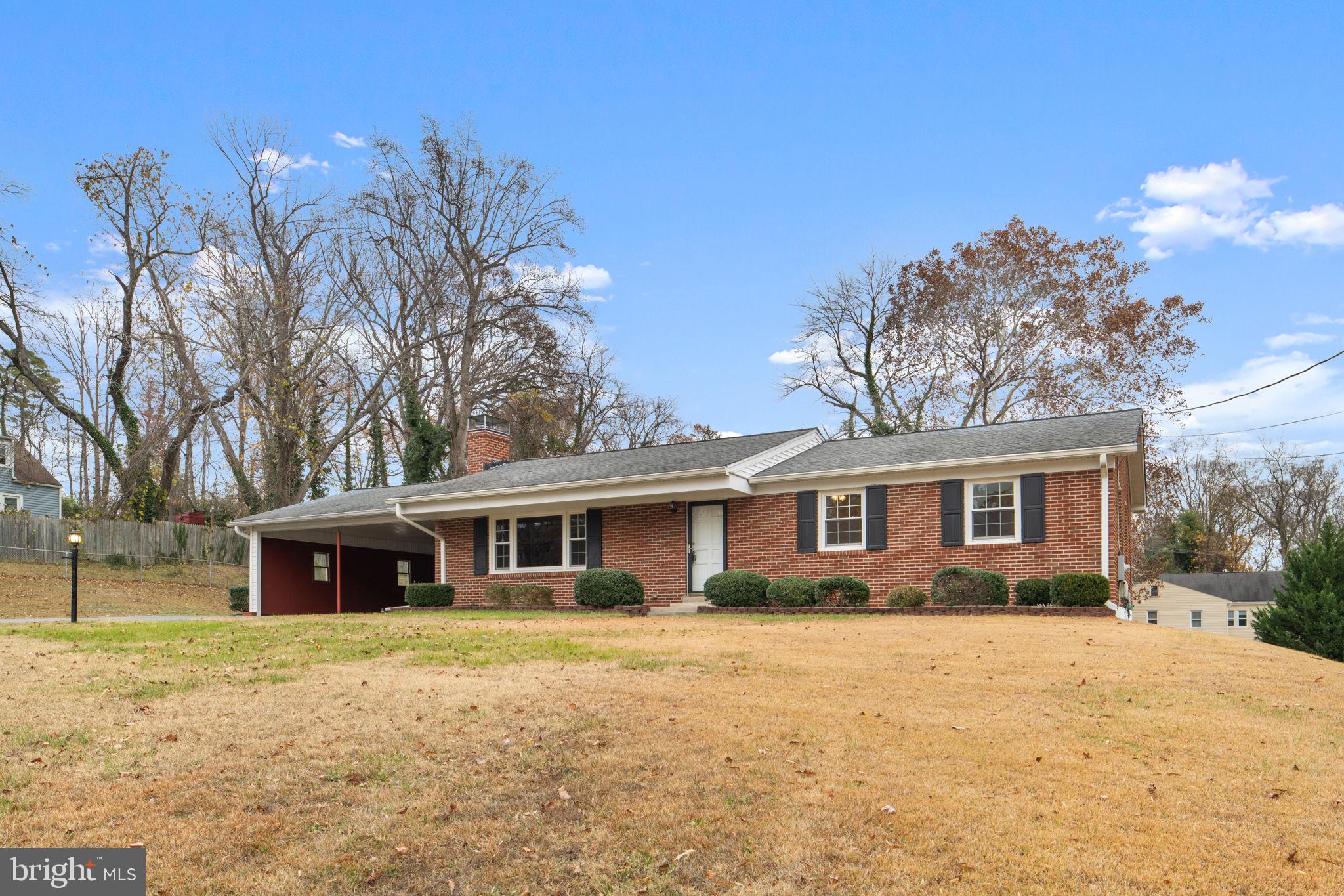 19227 Cardinal Heights Road Triangle, VA 22172 - Photo 64 of 64 a front view of a house with a yard