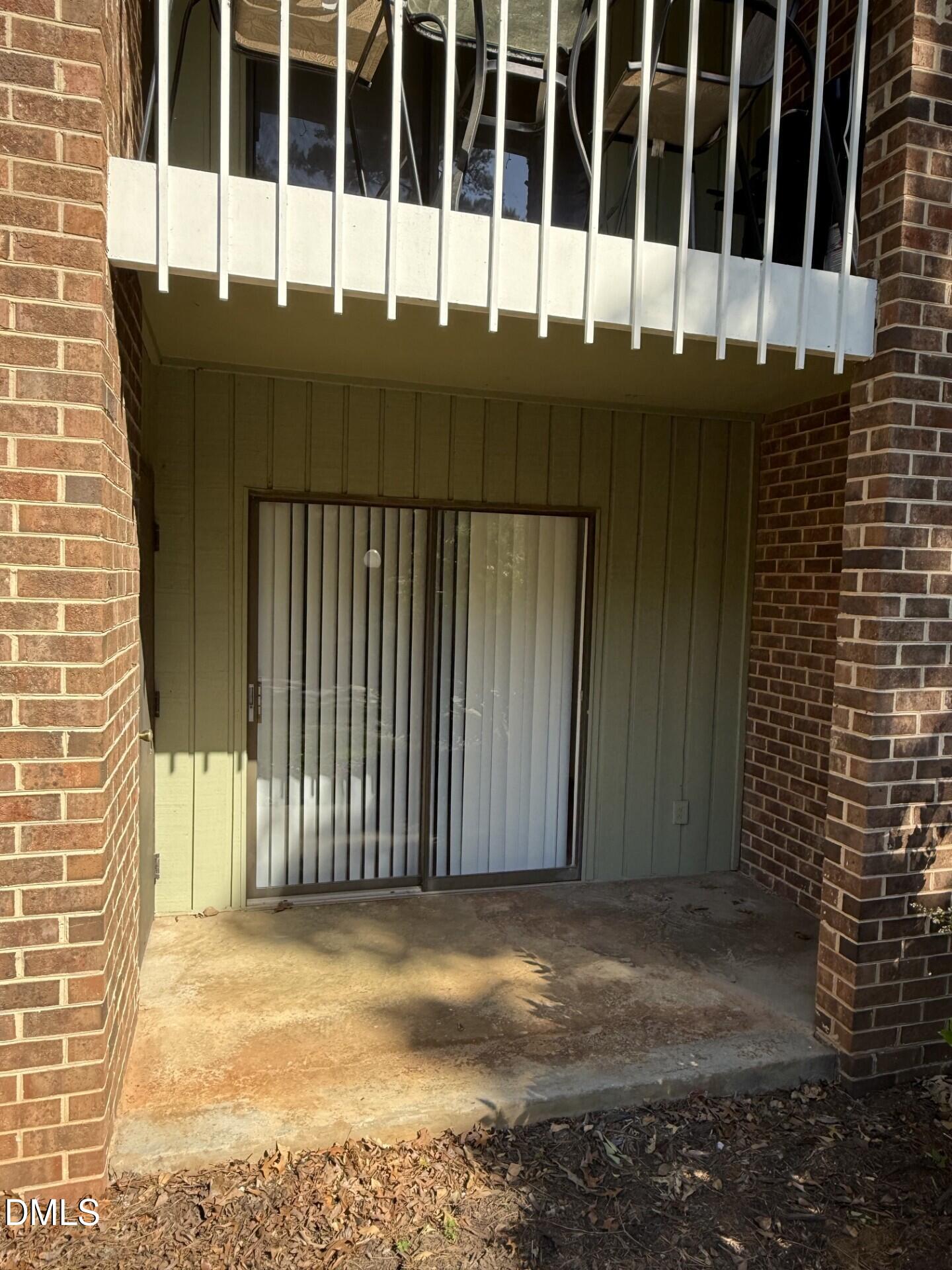 1299 Schaub Drive, Unit D Raleigh, NC 27606 - Photo 13 of 16 a view of a balcony